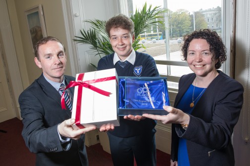The East Winner of the Bus Éireann ‘Go Places’ competition for transition year students is Ruairi Meehan from Dunshaughlin Community College, Co. Meath. Pictured is Ruairi receiving his award by Adrian O’Loughlin, Bus Éireann Regional Manager and Siobhan Griffin, Bus Éireann Regional School Transport Manager for the East. Ruairi won a brand new iPad and a trophy.